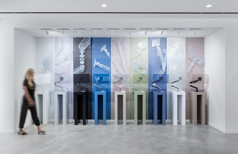 A Woman walking in a lobby area