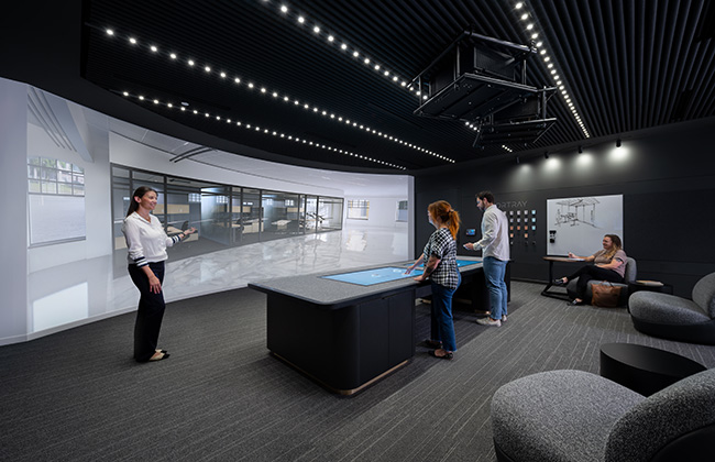 three people talking in a design center