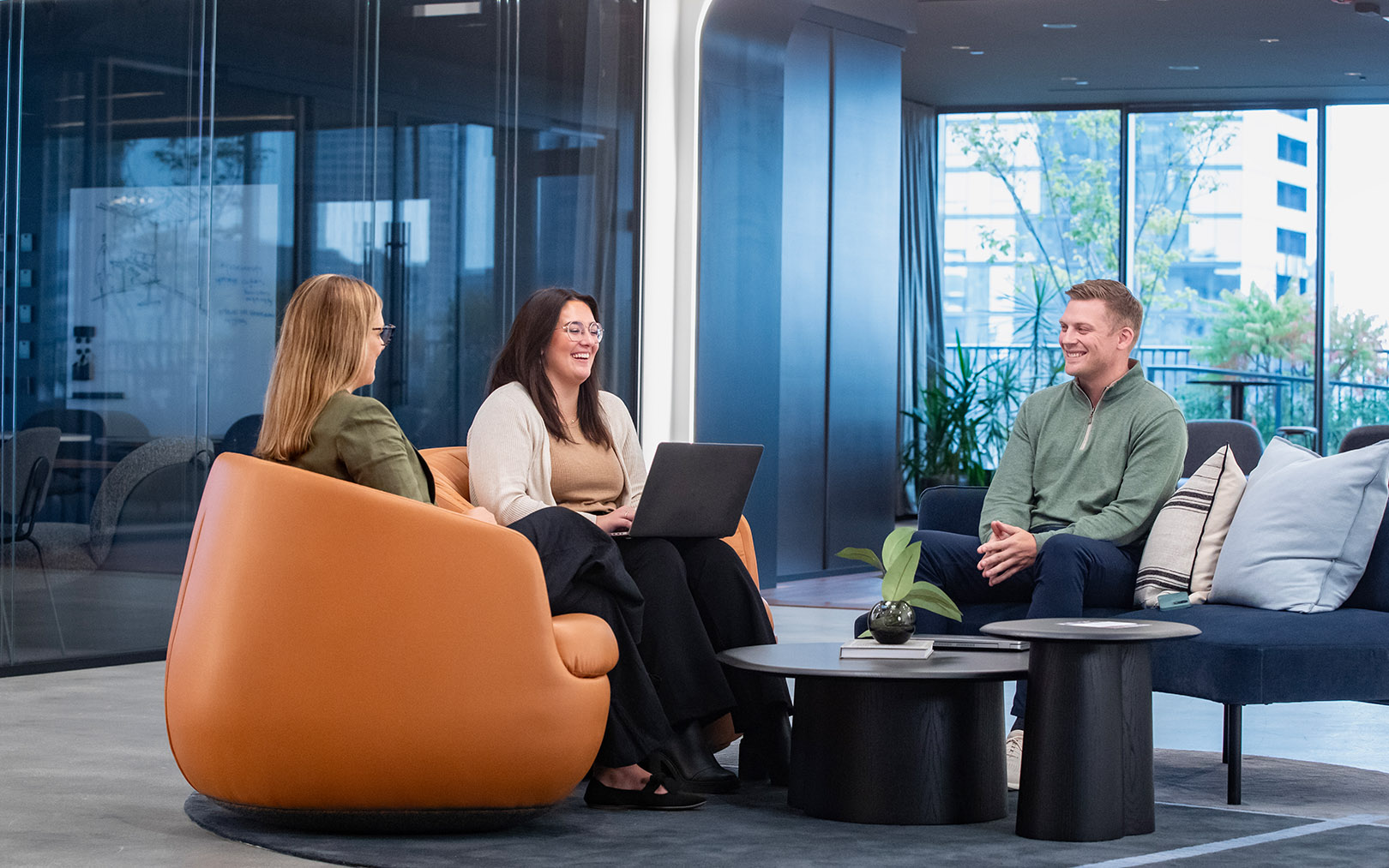 old photo of original employees with the word Family on top