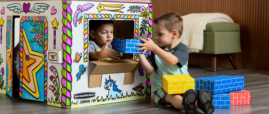 Image of two young boys playing with BB At Play Blocks and Playhouse