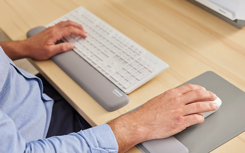 Image of a hand on a mouse mat
