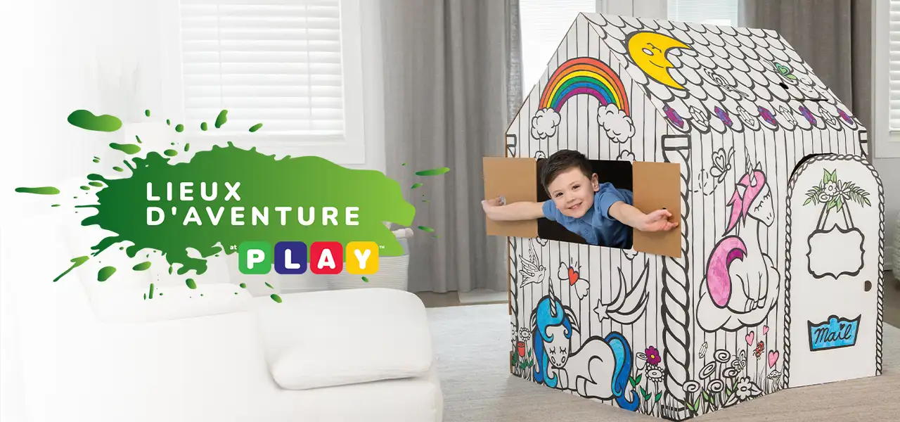 Boy playing in playhouse