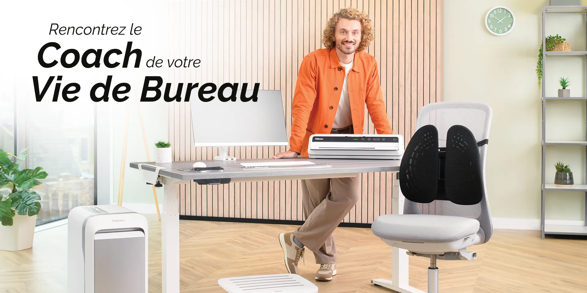 The WorkLife Coach leaning on a desk of Fellowes products