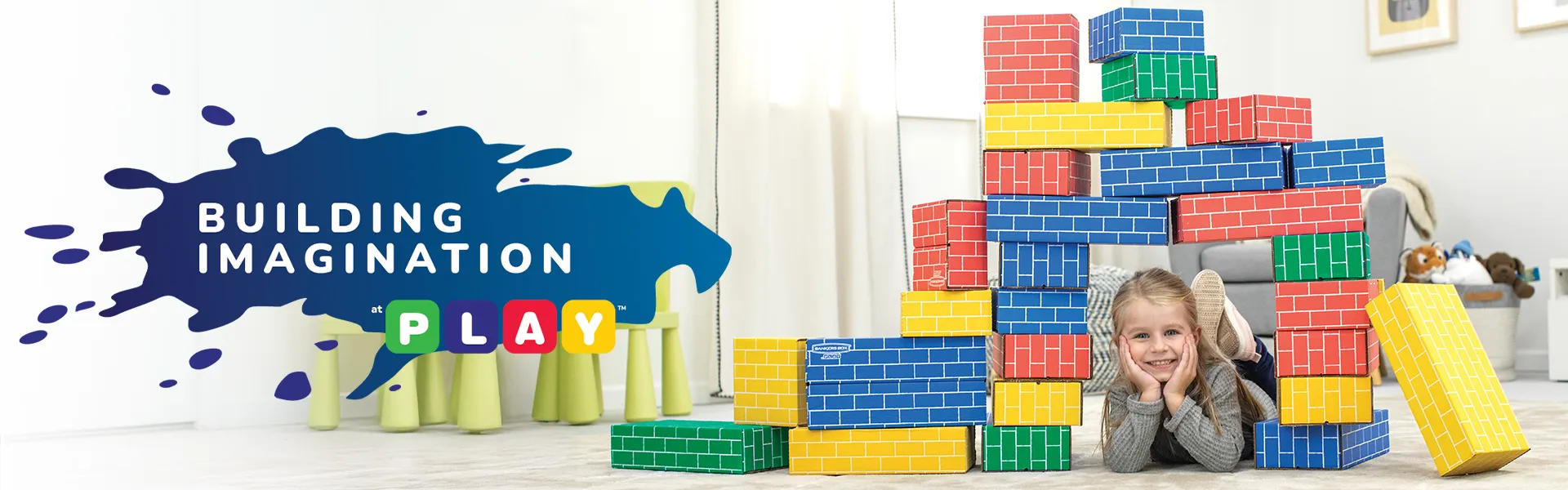 Girl playing in building blocks