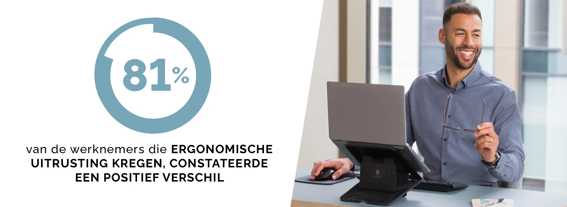 Man sat looking at a laptop