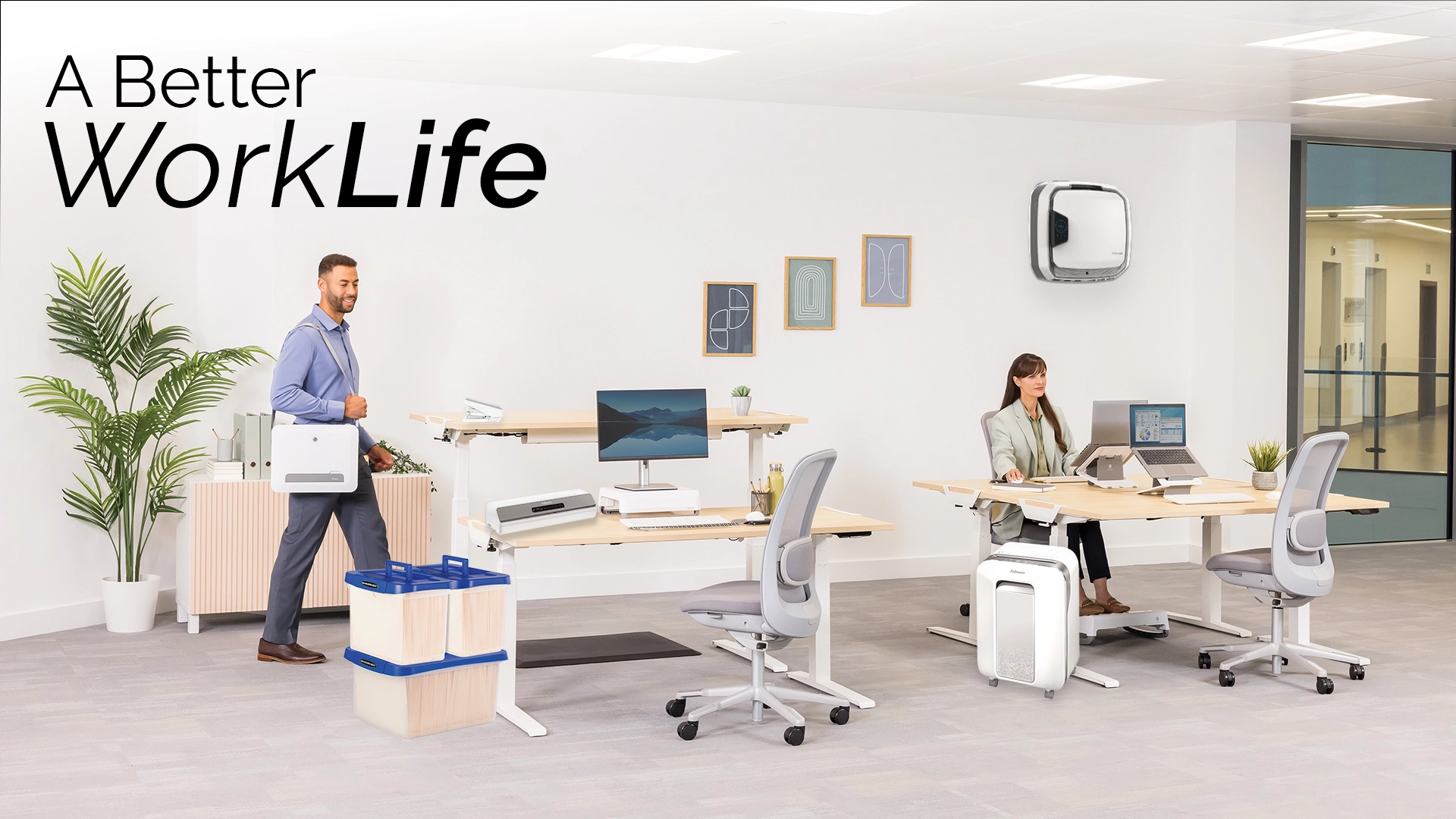 The WorkLife Coach leaning on a desk of Fellowes products