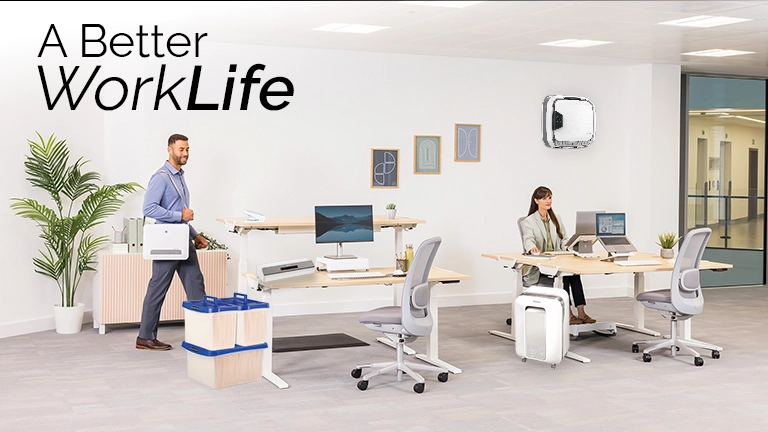 The WorkLife Coach leaning on a desk of Fellowes products