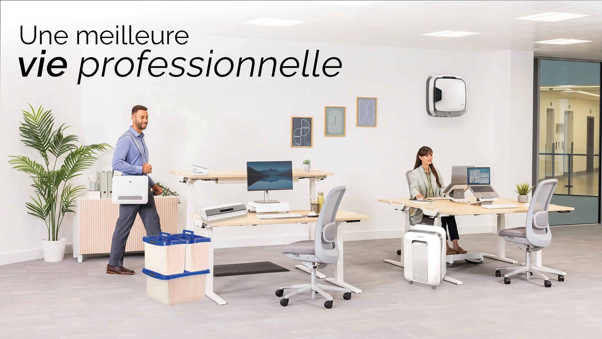 The WorkLife Coach leaning on a desk of Fellowes products