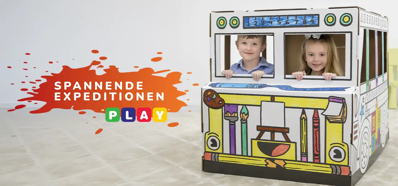 Boy playing in playhouse