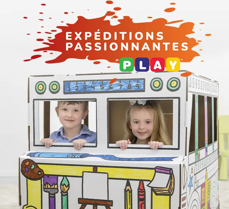 Boy playing in playhouse  