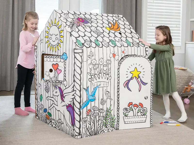 Children playing with PLAY™ buildings