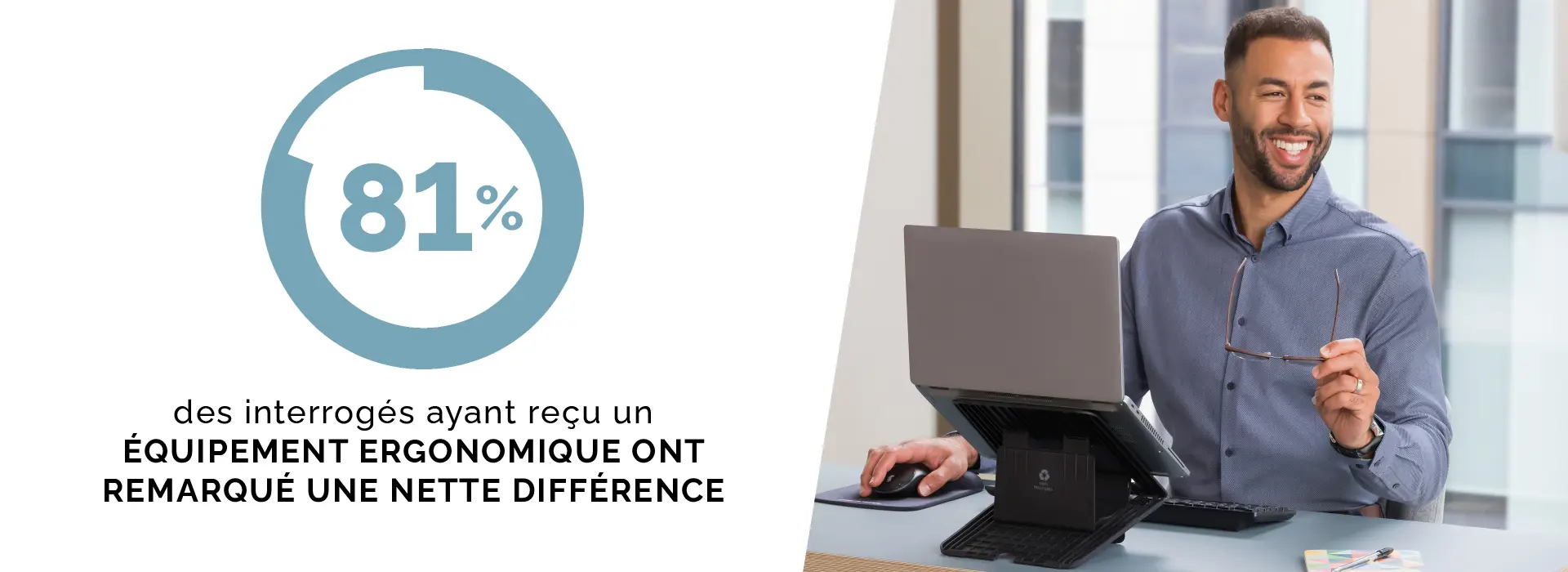 Man sat looking at a laptop