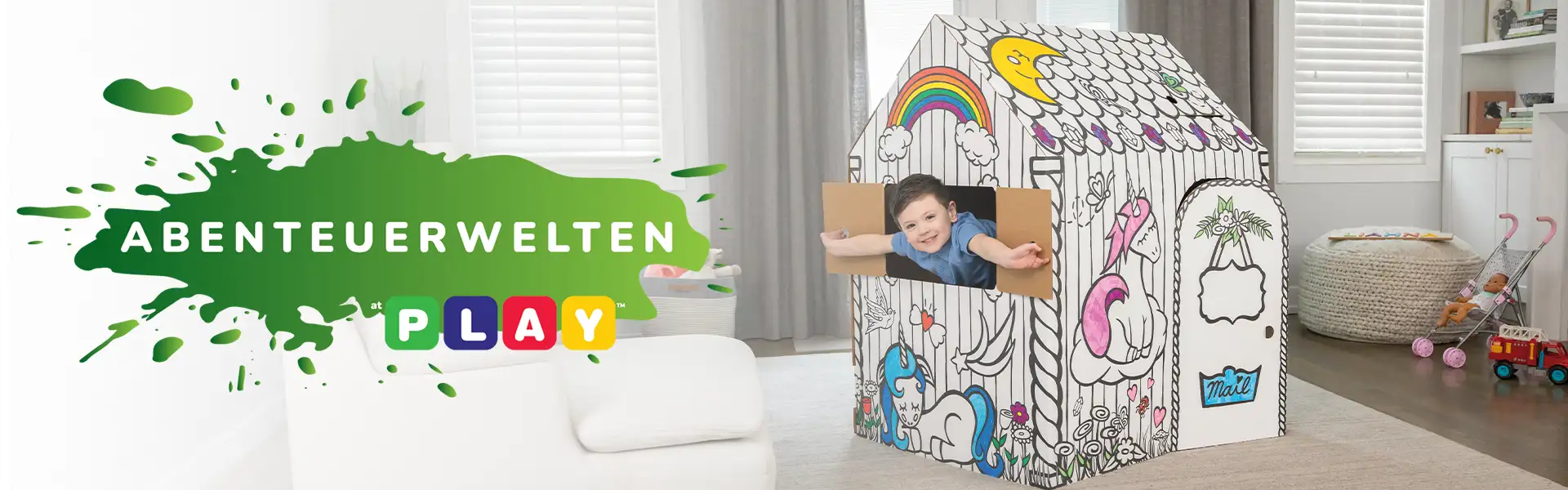 Boy playing in playhouse