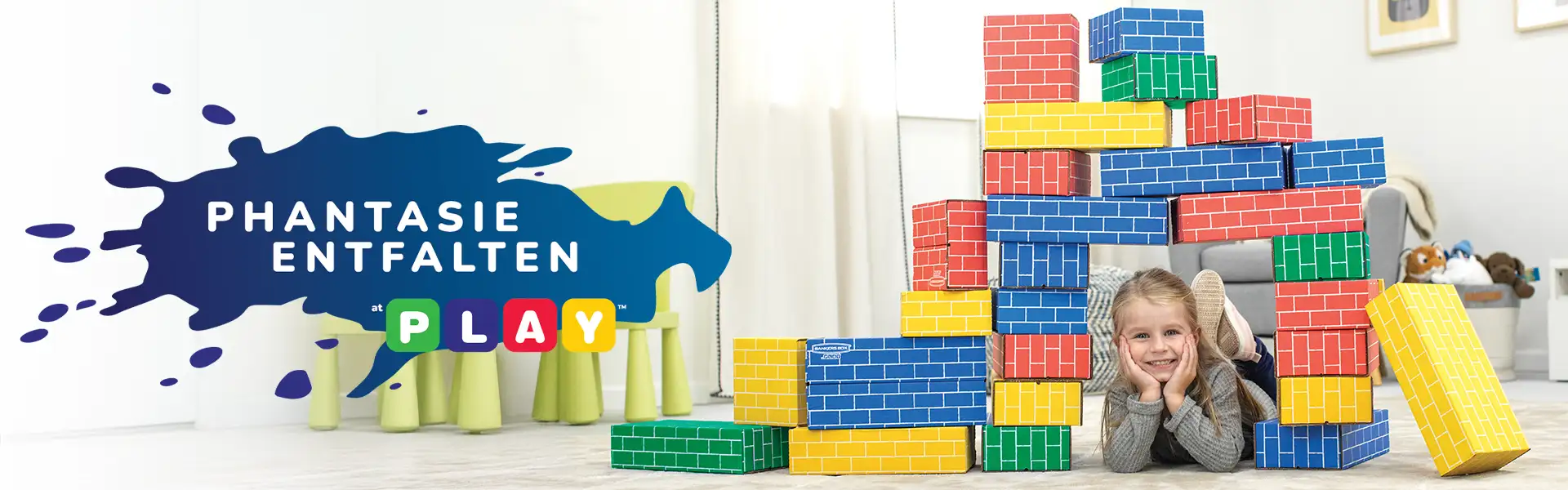 Girl playing in building blocks