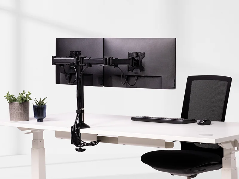 Dual monitor arm on desk