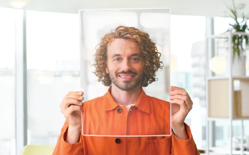 Worklife coach holding up a laminating pouch