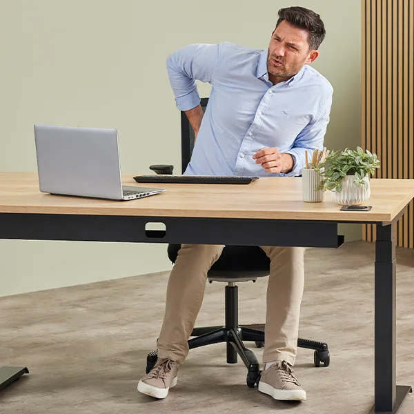 Man holding his back in pain