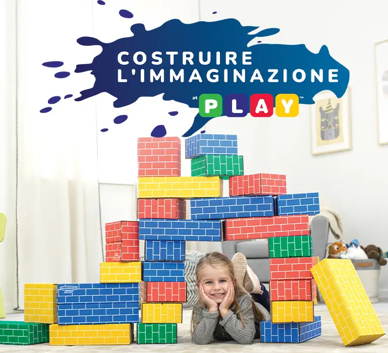 Girl playing in building blocks