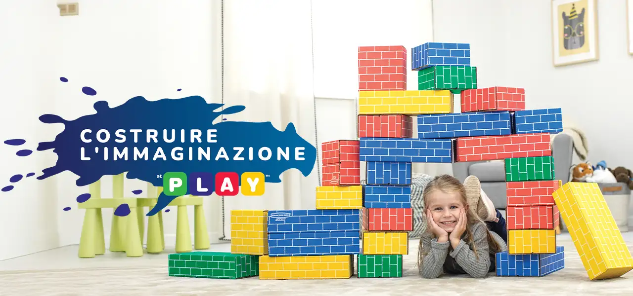 Girl playing in building blocks