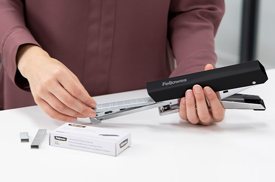 Image of someone using their laptop to look up Fellowes Modular Wall Configurator Tool