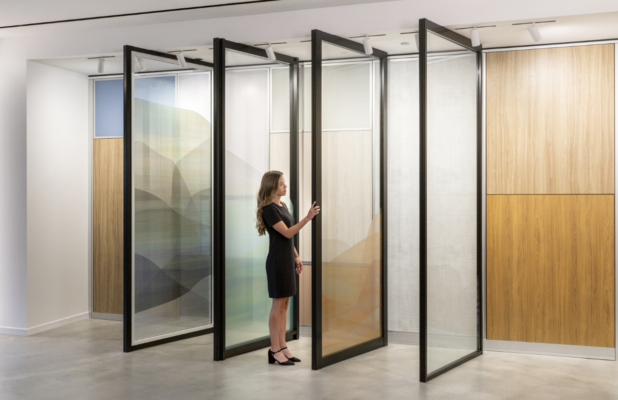 A woman looking at a Titan Door display