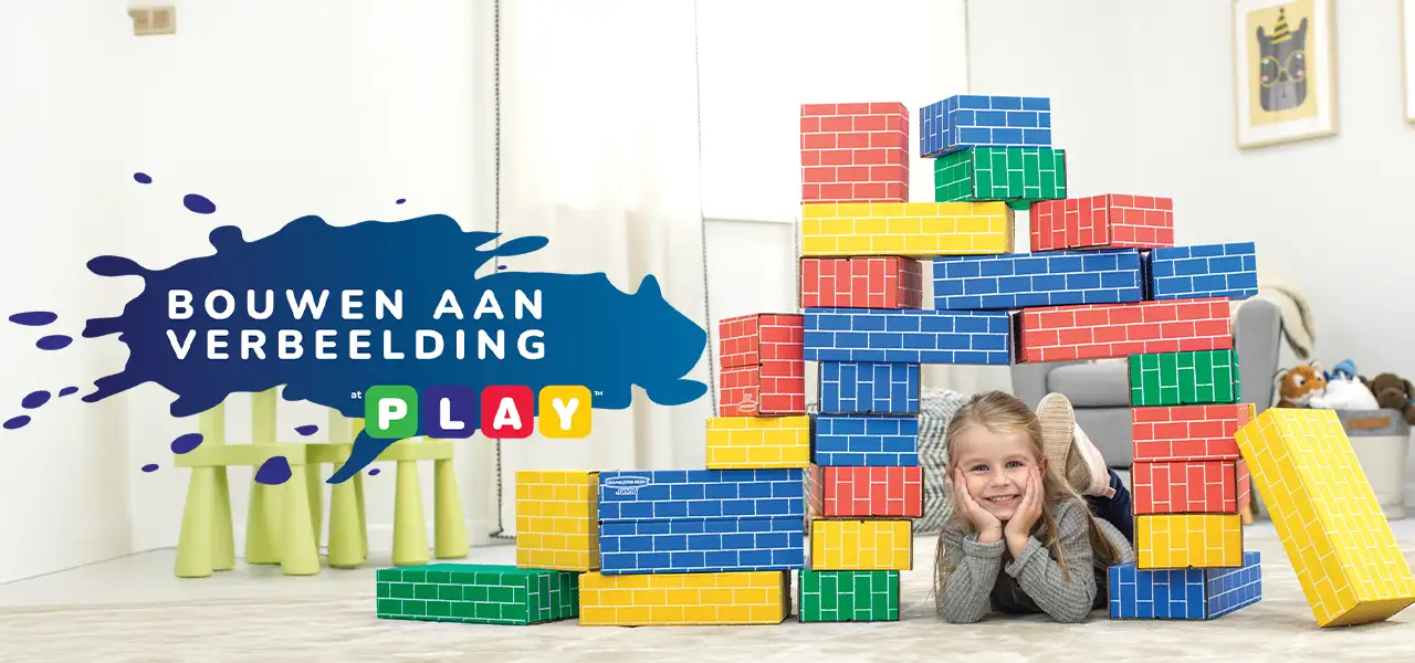 Girl playing in building blocks