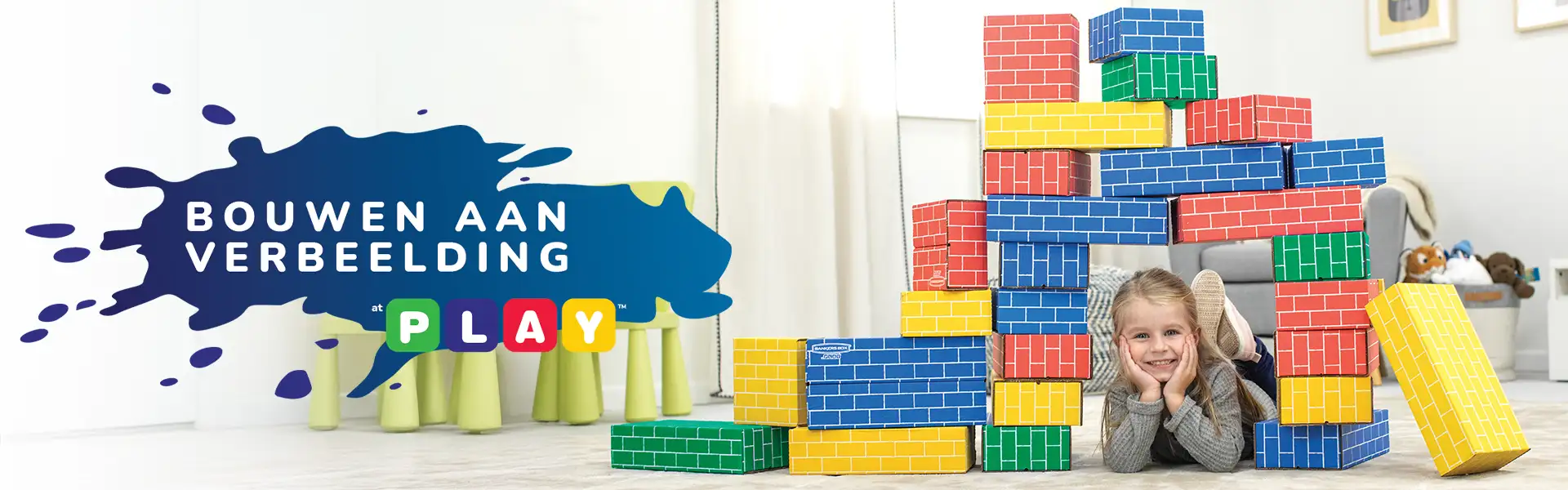 Girl playing in building blocks