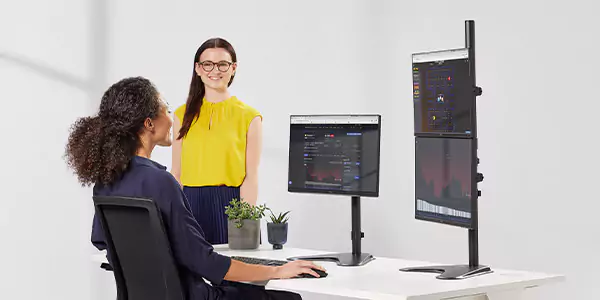Two female colleagues talking