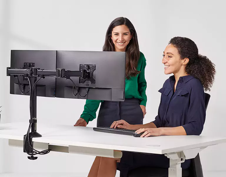 Two female colleagues talking