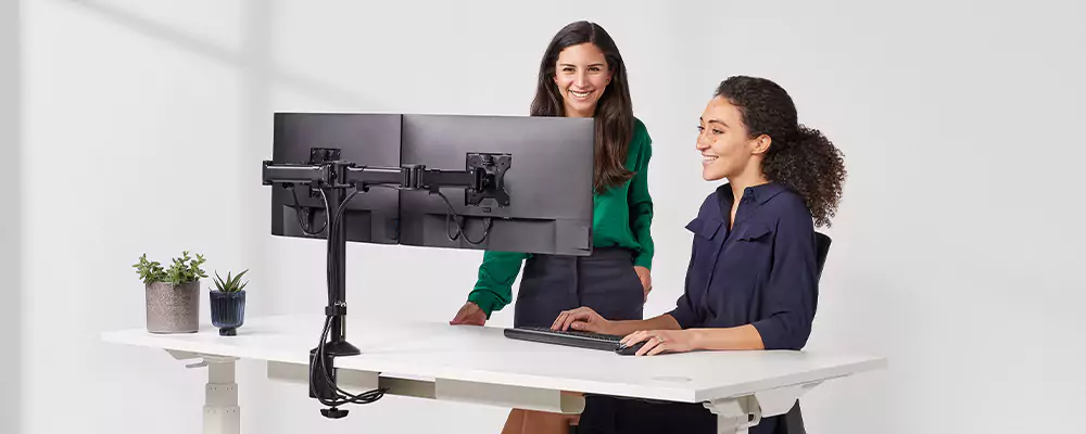 Two female colleagues talking