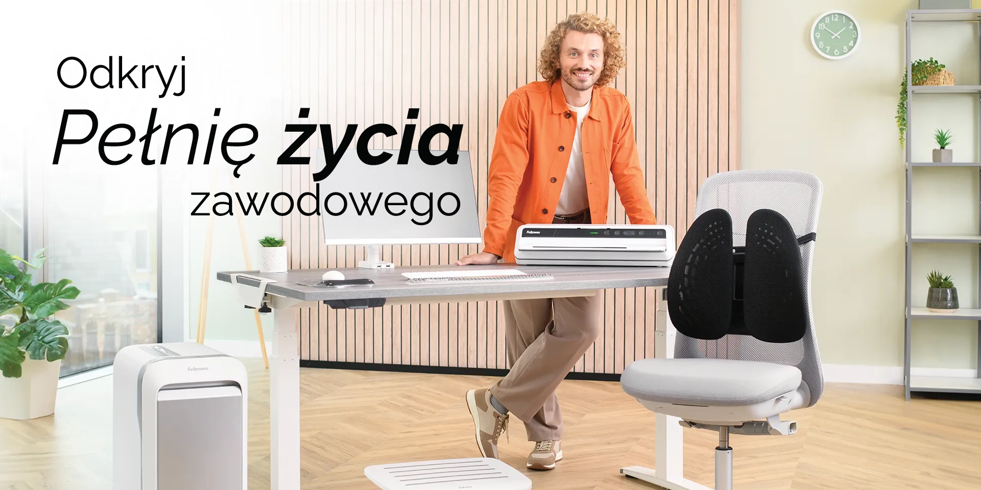 The WorkLife Coach leaning on a desk of Fellowes products