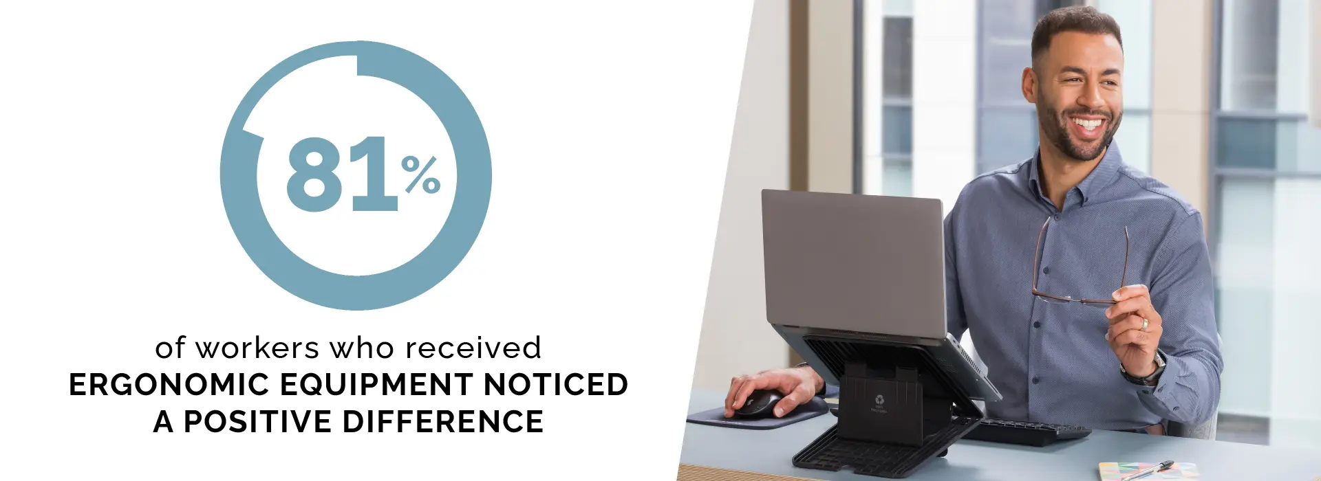 Man sat looking at a laptop