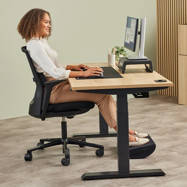 Using an ergonomic desk