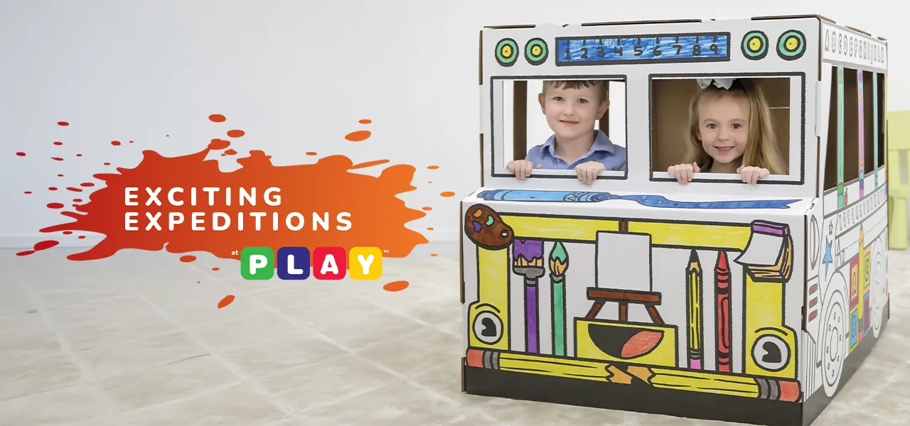 Boy playing in playhouse