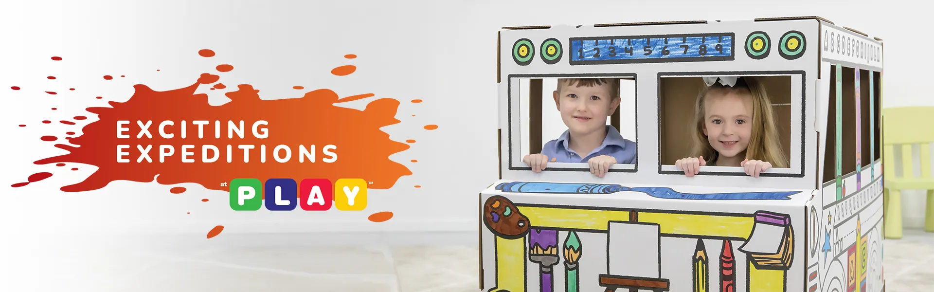 Boy playing in playhouse