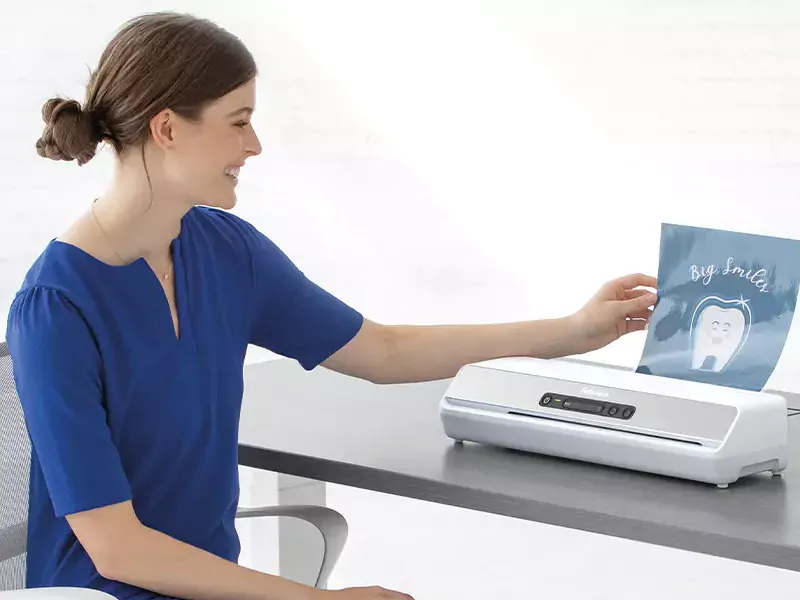 Woman using a shredder
