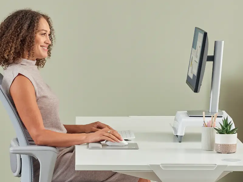 Lady using a wrist rest