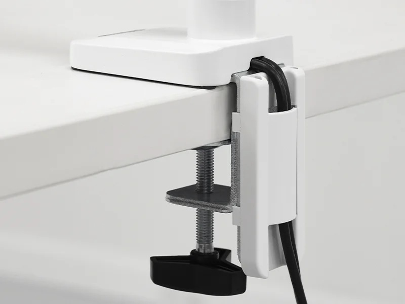 Monitor arm attached to desk