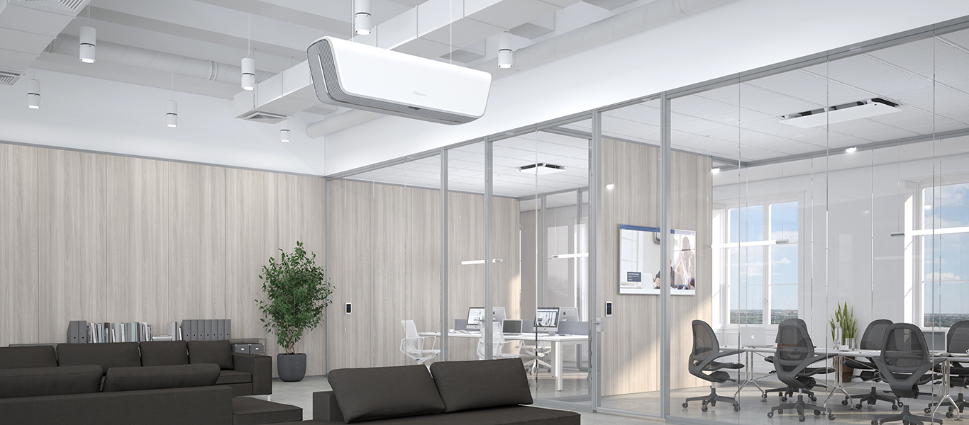 Photo of an empty office space with glass meeting rooms and the Array Ceiling in view