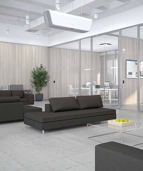 Photo of an empty office space with glass meeting rooms and the Array Ceiling in view