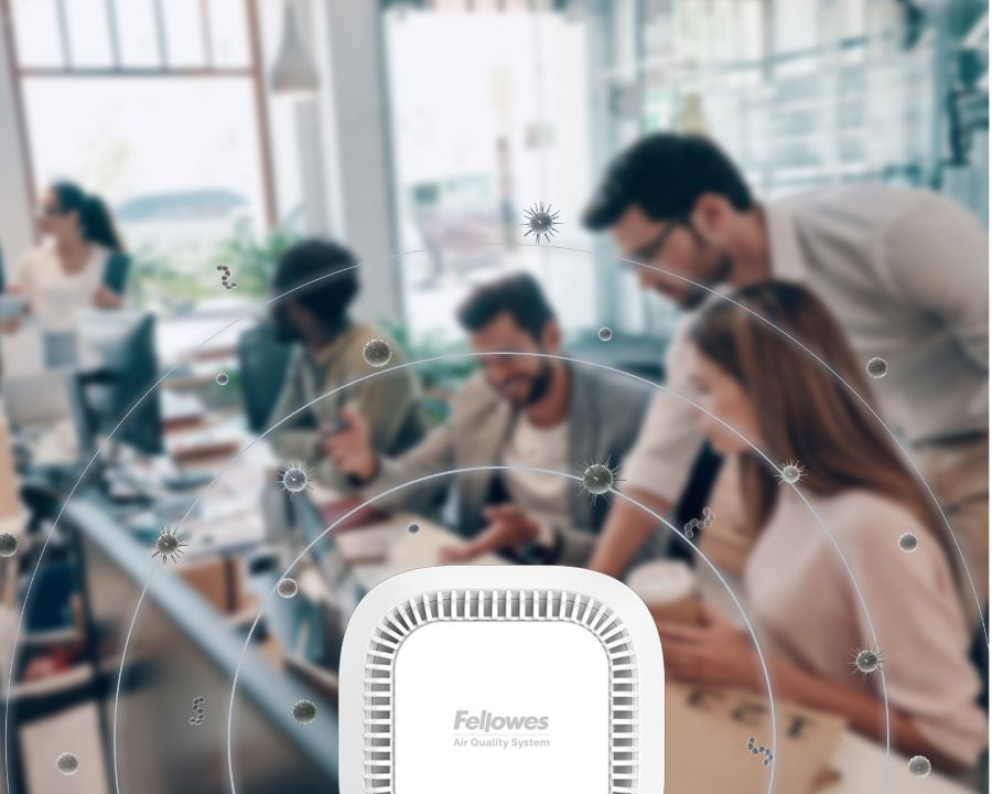 Group of people working in an office with the depection of germs in the air