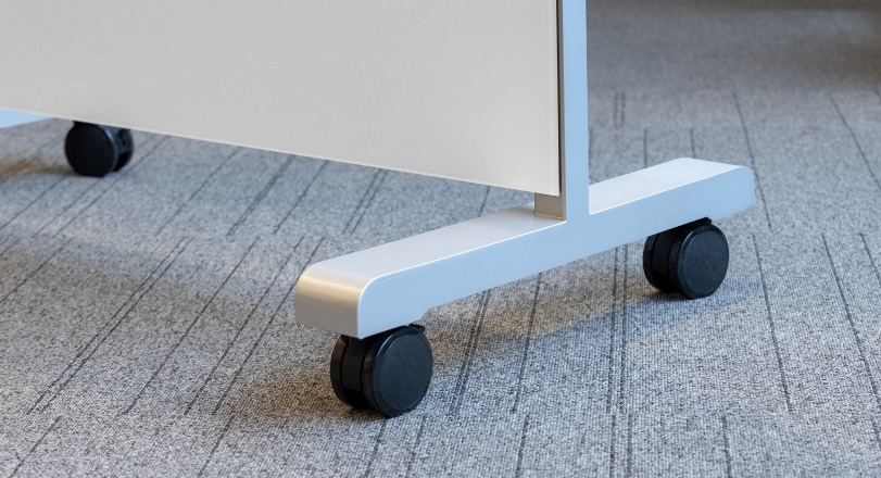 a close-up of the bottom frame and casters on the eM Markerboard