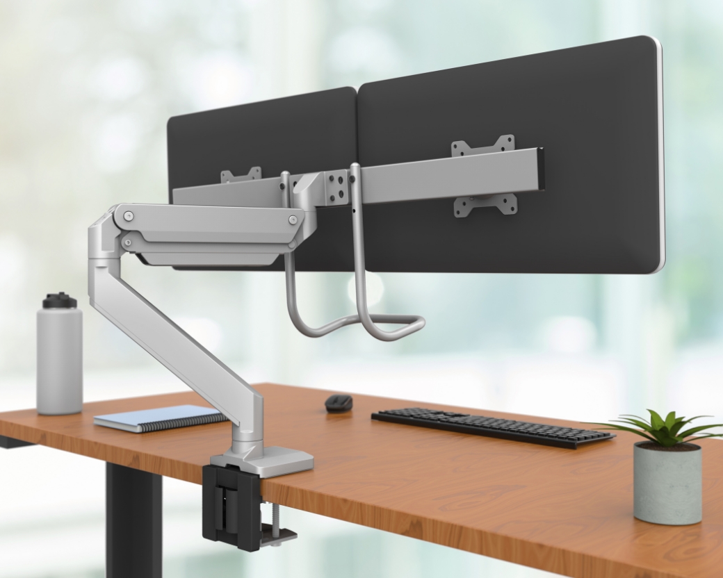 Image of an EPPA monitor arm on a desk