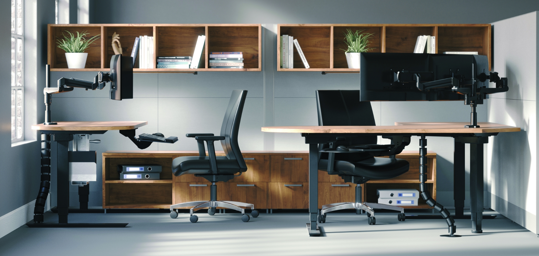 Image of a dual monitor arm attached to a desk