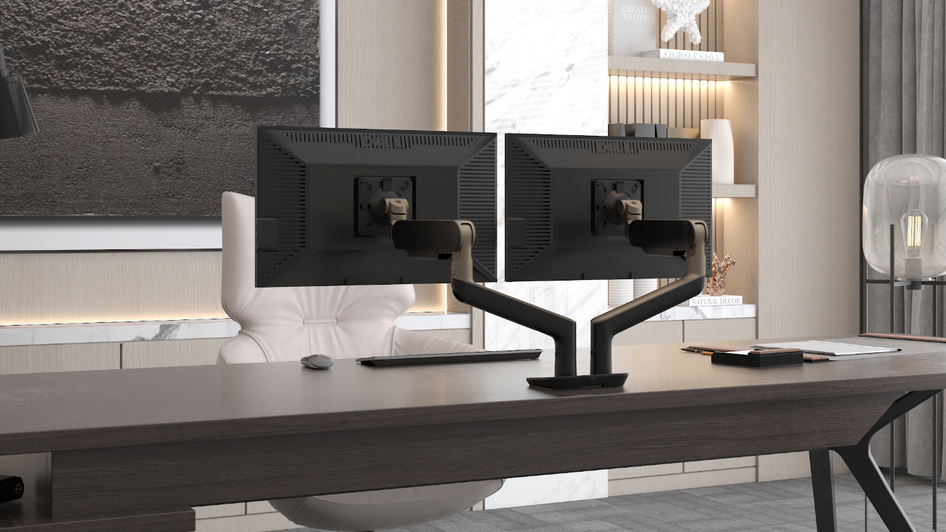Image of a dual monitor arm attached to a desk