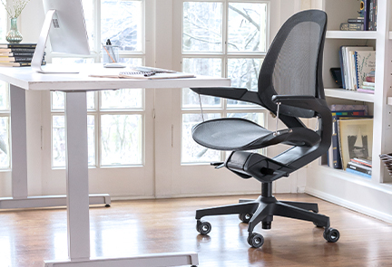 View of an empty chair at someones desk