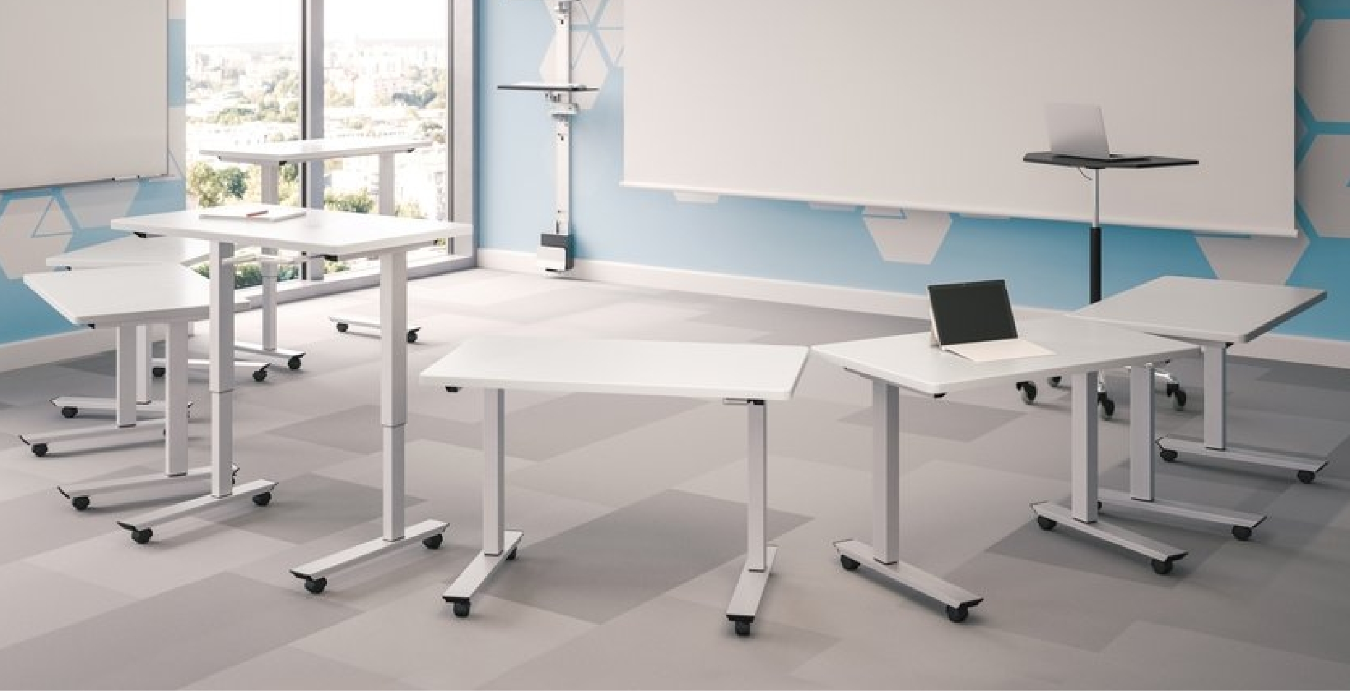 Image of multiple Q-Crank tables in a classroom setting