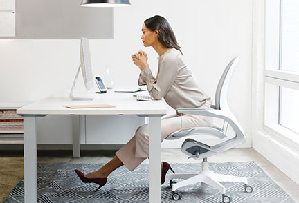 Woman sitting at desk working