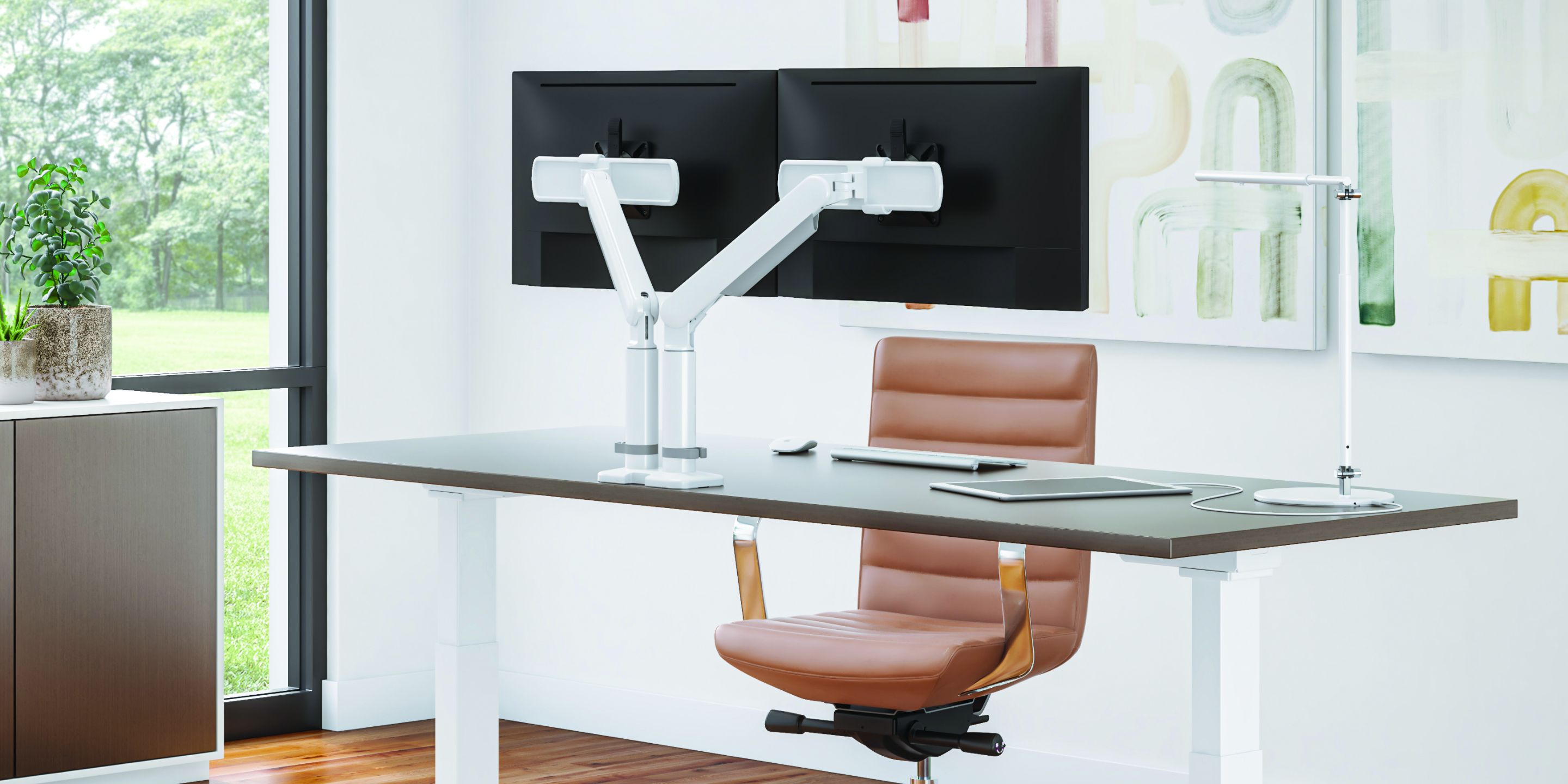 Image of monitor arms on a desk