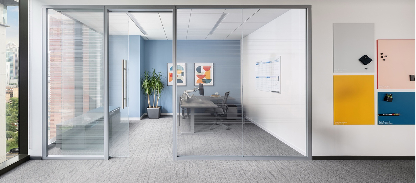 Image of an office room created with Volo Walls containing an All-Flex table and Solo Markerboard